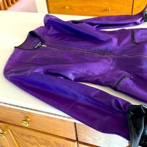 Begedor 1980s purple leather dress featuring a two way zipper and side zippers.